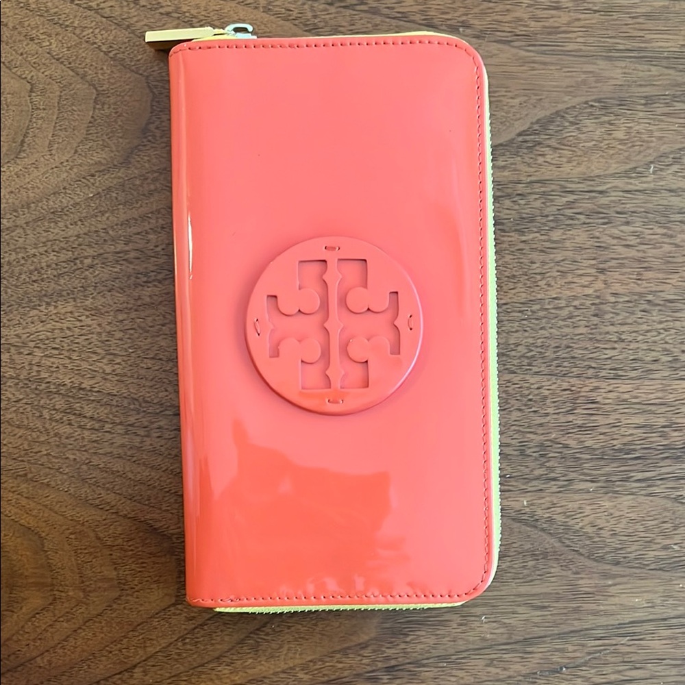 Tory Burch pink patent wallet with yellow zip closure